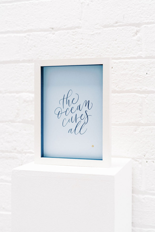 'The ocean cures all' Framed Print