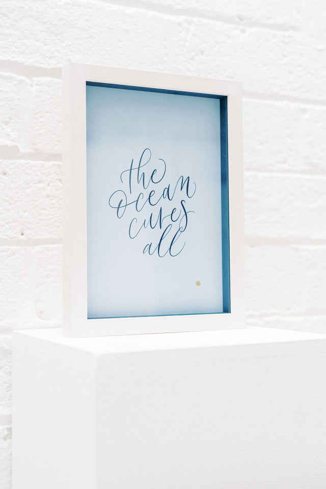 'The ocean cures all' Framed Print